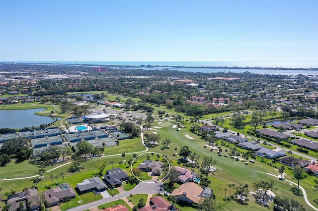 bird's eye view with a residential view, golf course view, and a water view
