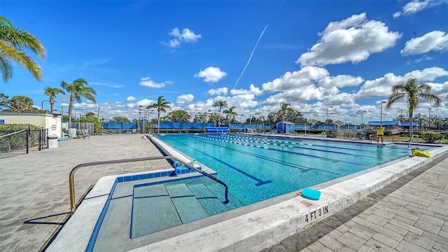 pool featuring fence