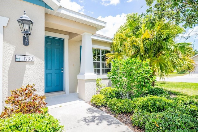 11790 Fennemore Way, Parrish, FL 34219 - entrance to property with stucco siding