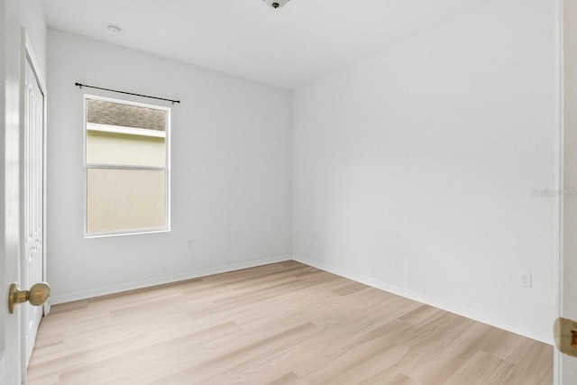 11790 Fennemore Way, Parrish, FL 34219 - spare room featuring baseboards and light wood-style flooring