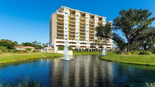 view of building exterior with a water view