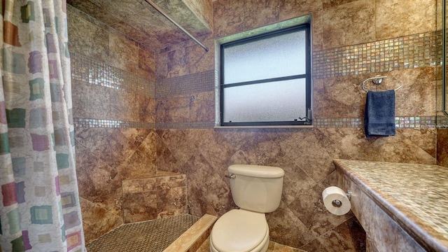 5630 Golf Pointe Dr Unit 205, Sarasota, FL 34243 - bathroom with toilet and tiled shower
