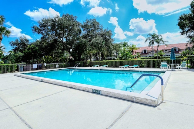 5630 Golf Pointe Dr Unit 205, Sarasota, FL 34243 - community pool featuring fence and a patio
