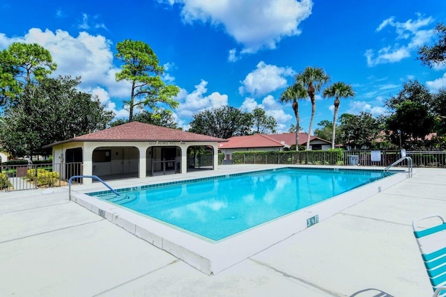 5630 Golf Pointe Dr Unit 205, Sarasota, FL 34243 - pool with a patio area and fence