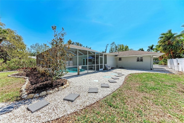 3304 7th Street Ct W, Palmetto, FL 34221 - back of property with a patio area, a lanai, and stucco siding