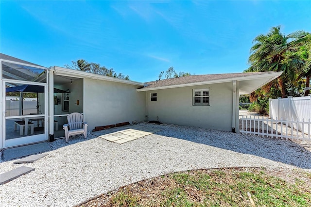 3304 7th Street Ct W, Palmetto, FL 34221 - rear view of property with stucco siding, a patio, and a lanai