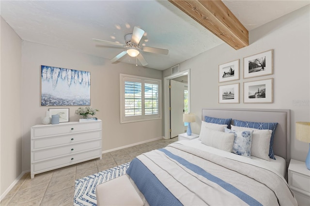 3304 7th Street Ct W, Palmetto, FL 34221 - tiled bedroom with beamed ceiling and a ceiling fan