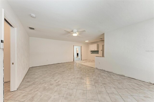 3304 7th Street Ct W, Palmetto, FL 34221 - empty room featuring ceiling fan and a smoke detector