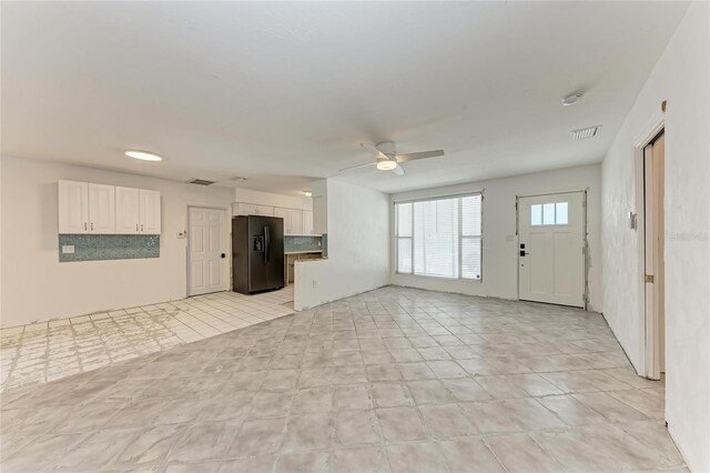 3304 7th Street Ct W, Palmetto, FL 34221 - unfurnished living room with a ceiling fan