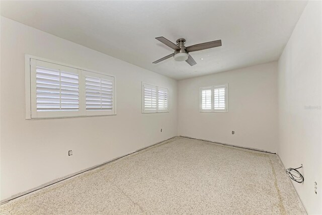 3304 7th Street Ct W, Palmetto, FL 34221 - unfurnished room with a ceiling fan and speckled floor