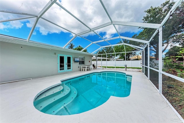 3304 7th Street Ct W, Palmetto, FL 34221 - view of swimming pool with french doors, a patio area, and glass enclosure