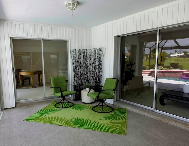 view of patio featuring a lanai and an outdoor pool
