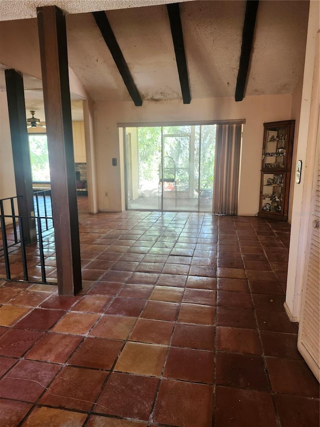 1862 Orangewood Ln, Sarasota, FL 34232 - spare room featuring vaulted ceiling with beams