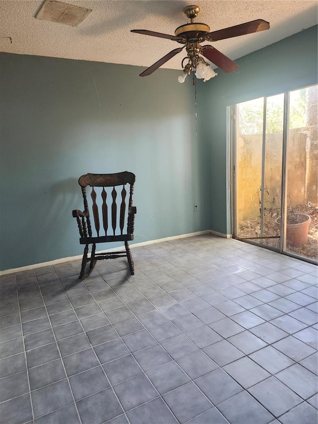 1862 Orangewood Ln, Sarasota, FL 34232 - unfurnished room with a textured ceiling, visible vents, baseboards, and ceiling fan