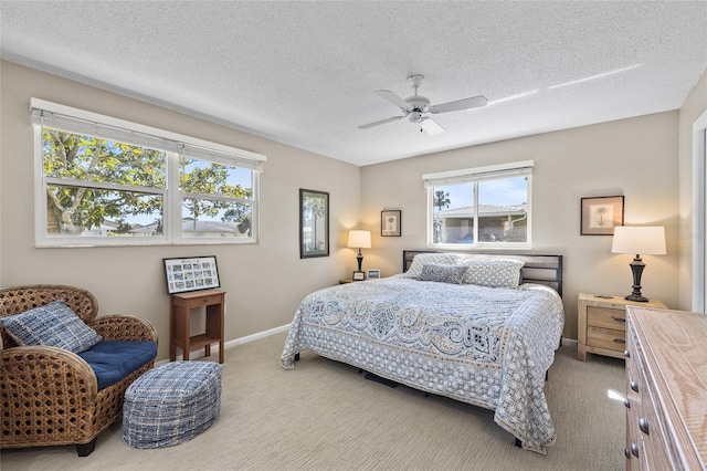7122 11th Ave W, Bradenton, FL 34209 - carpeted bedroom with ceiling fan, a textured ceiling, and baseboards