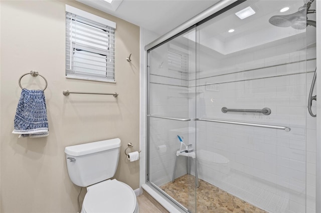 7122 11th Ave W, Bradenton, FL 34209 - full bathroom featuring recessed lighting, a stall shower, and toilet