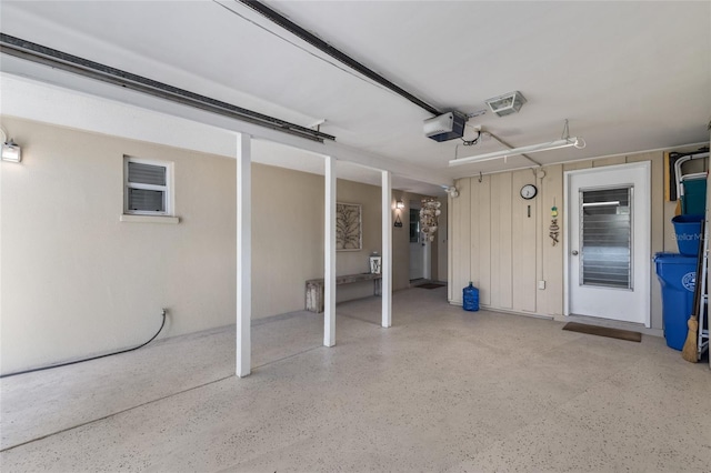 7122 11th Ave W, Bradenton, FL 34209 - garage featuring a garage door opener