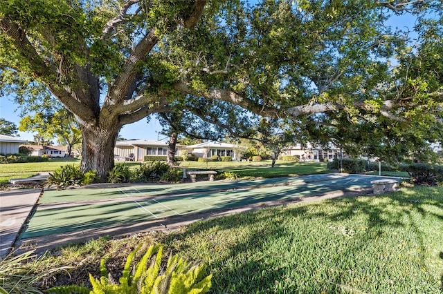 7122 11th Ave W, Bradenton, FL 34209 - surrounding community with shuffleboard and a yard