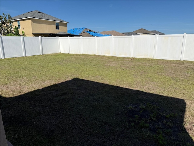 view of yard featuring fence private yard