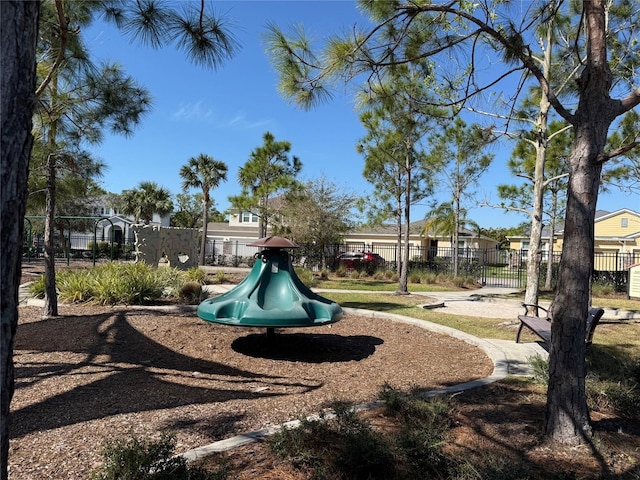 community play area featuring fence