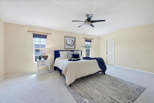 4406 17th St W, Palmetto, FL 34221 - carpeted bedroom featuring a textured ceiling, baseboards, and a ceiling fan