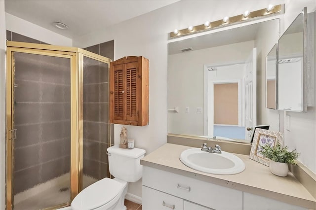 4406 17th St W, Palmetto, FL 34221 - bathroom featuring toilet, vanity, and a shower stall