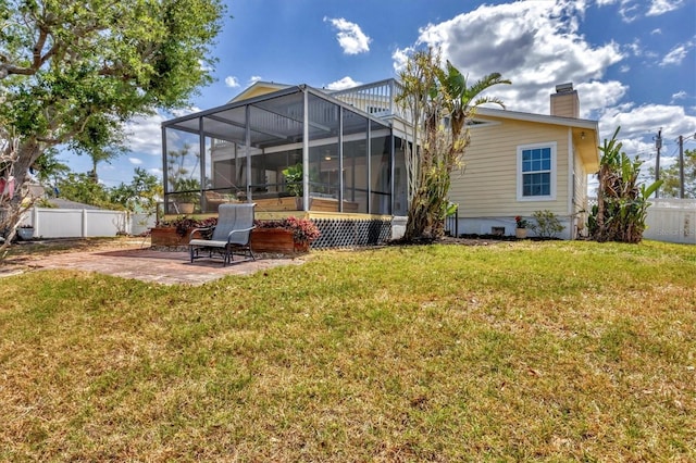 4406 17th St W, Palmetto, FL 34221 - rear view of property featuring a patio area and a chimney