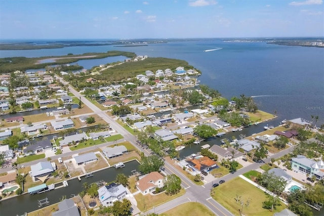 4406 17th St W, Palmetto, FL 34221 - aerial view of property and surrounding area featuring a large body of water and nearby suburban area