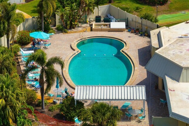 4440 Ironwood Cir Unit 509D, Bradenton, FL 34209 - community pool with a fenced backyard and a patio area