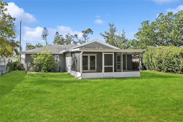 2039 Kai Dr, Sarasota, FL 34231 - rear view of property with a sunroom