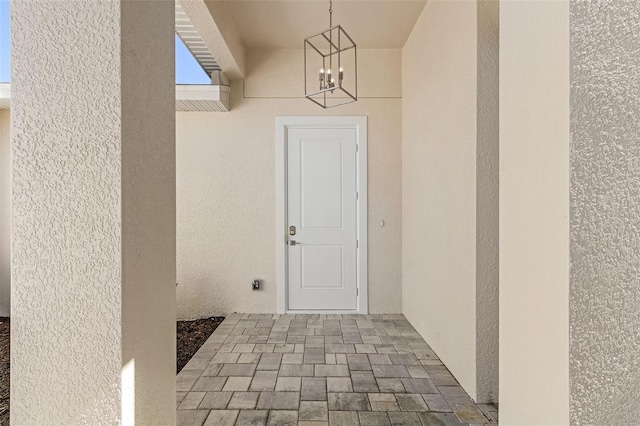 2364 Carpenter Ln, North Port, FL 34286 - view of exterior entry with stucco siding