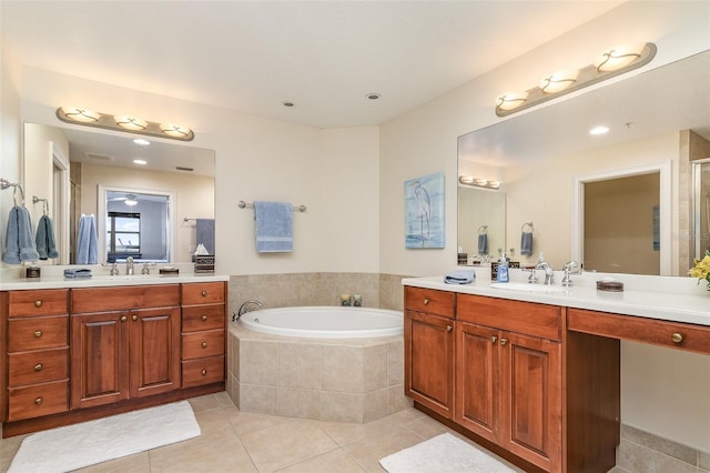 615 Riviera Dunes Way Unit 208, Palmetto, FL 34221 - full bath with tile patterned flooring, a bath, two vanities, and a stall shower