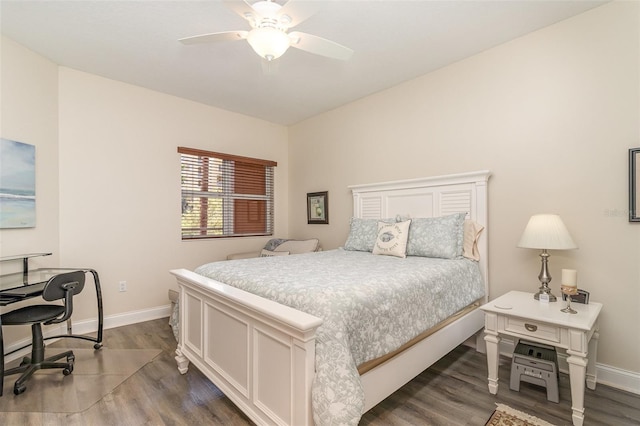 615 Riviera Dunes Way Unit 208, Palmetto, FL 34221 - bedroom with dark wood finished floors, a desk, and ceiling fan