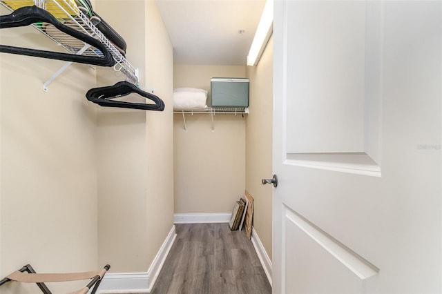 615 Riviera Dunes Way Unit 208, Palmetto, FL 34221 - spacious closet with wood finished floors