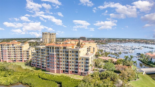 615 Riviera Dunes Way Unit 208, Palmetto, FL 34221 - view of apartment building / complex with a water view and view of marina