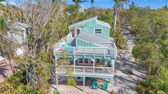 111 Faubel St, Sarasota, FL 34242 - exterior space with board and batten siding
