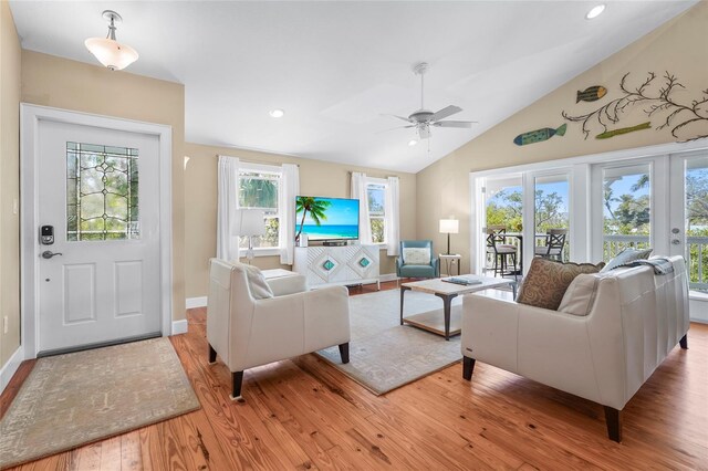 111 Faubel St, Sarasota, FL 34242 - living room featuring vaulted ceiling, recessed lighting, baseboards, light wood finished floors, and ceiling fan