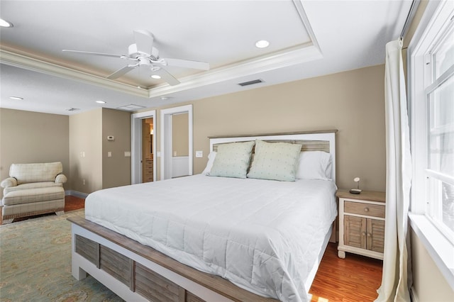 111 Faubel St, Sarasota, FL 34242 - bedroom with a raised ceiling, recessed lighting, visible vents, and wood finished floors