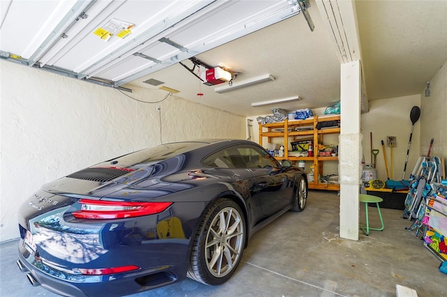 111 Faubel St, Sarasota, FL 34242 - garage featuring a garage door opener