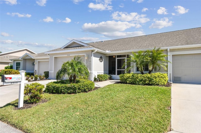 ranch-style home with stucco siding, an attached garage, driveway, and a front lawn