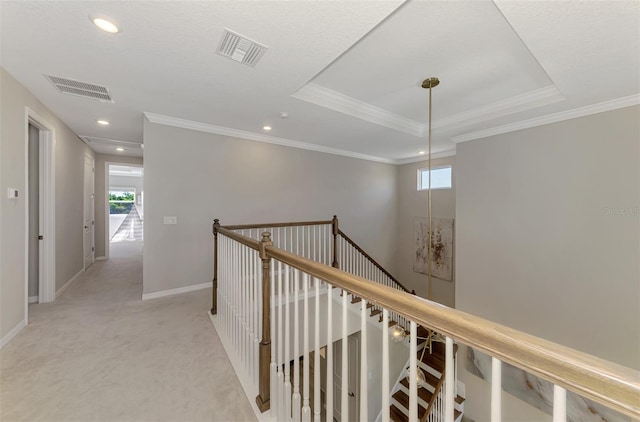 hallway with baseboards, an upstairs landing, visible vents, and recessed lighting