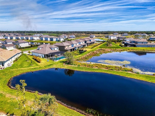 bird's eye view featuring a residential view and a water view