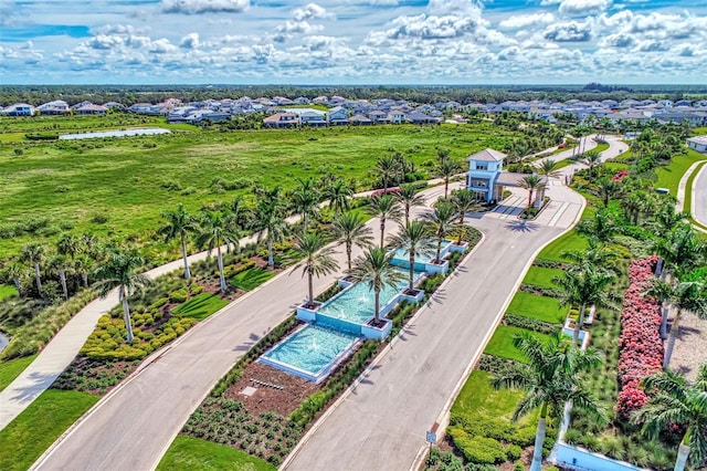 aerial view with a water view and a residential view