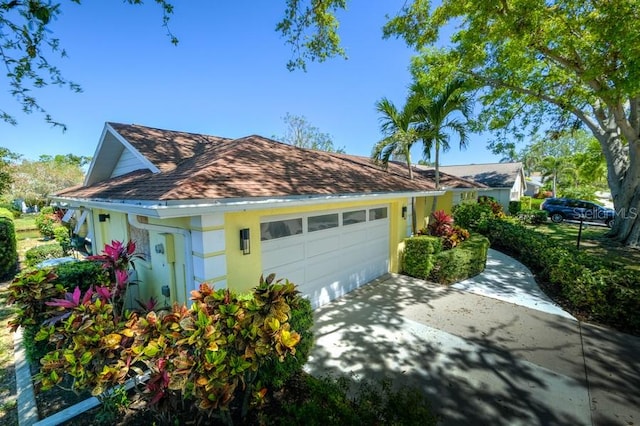 exterior space with concrete driveway