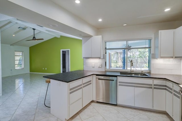 kitchen featuring open floor plan, a sink, dishwasher, a peninsula, and vaulted ceiling with beams