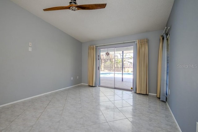 unfurnished room with light tile patterned flooring, baseboards, vaulted ceiling, and ceiling fan
