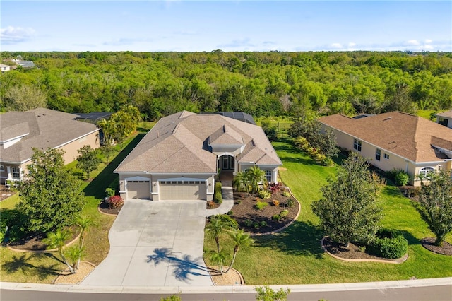 391 Snapdragon Loop, Bradenton, FL 34212 - view of subject property featuring a forest