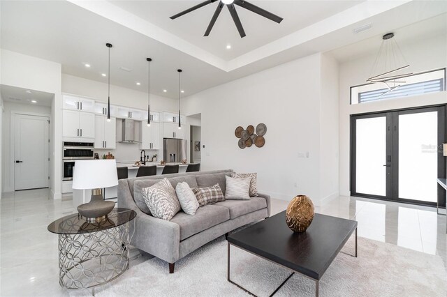 1815 SW 15th Pl, Cape Coral, FL 33991 - living room featuring a high ceiling, recessed lighting, a ceiling fan, and french doors