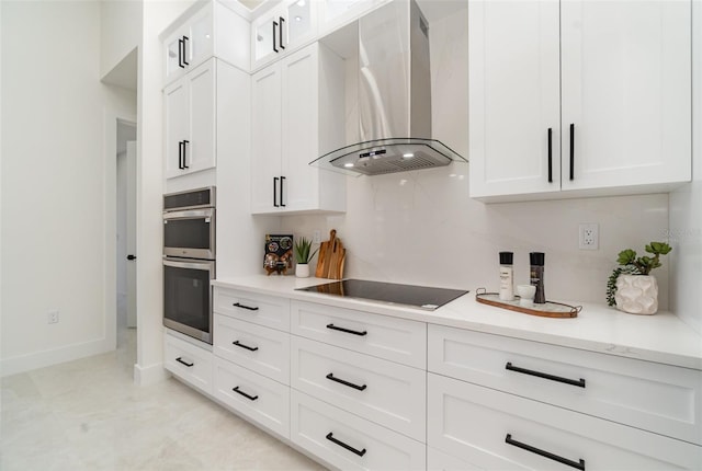 1815 SW 15th Pl, Cape Coral, FL 33991 - kitchen featuring wall chimney range hood, black electric stovetop, double oven, and white cabinets