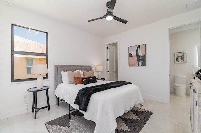 1815 SW 15th Pl, Cape Coral, FL 33991 - bedroom with baseboards, ceiling fan, and ensuite bathroom